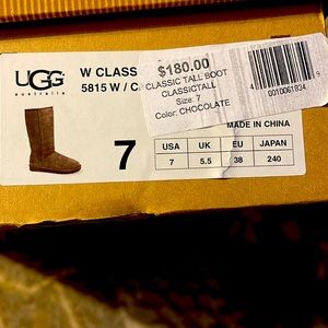 Size 7,chocolate brown UGG Classic Tall snow boots .